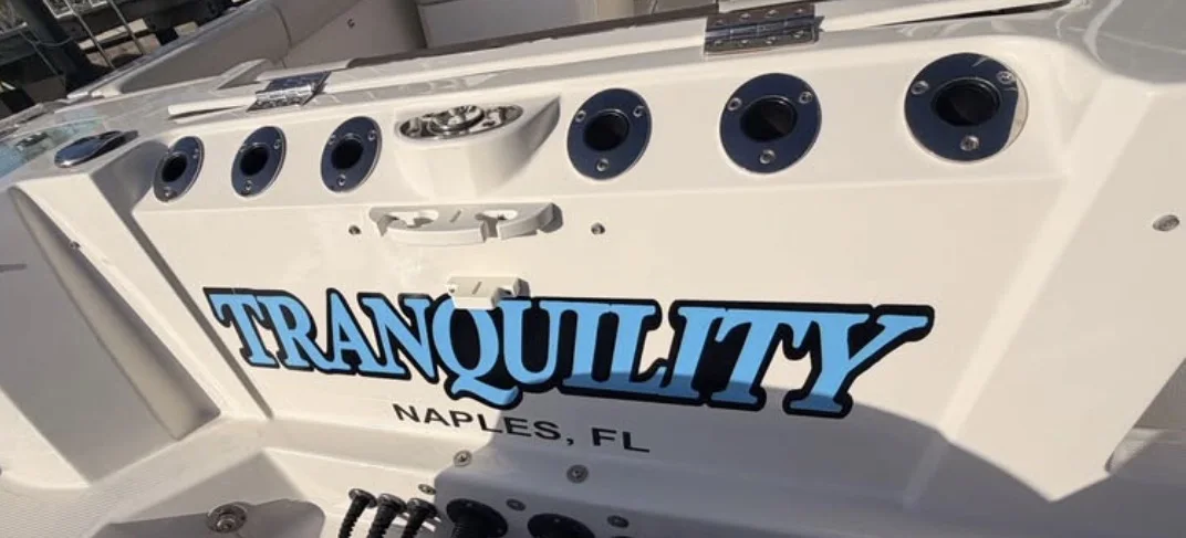 Tranquility: Boat name and hailing port lettering