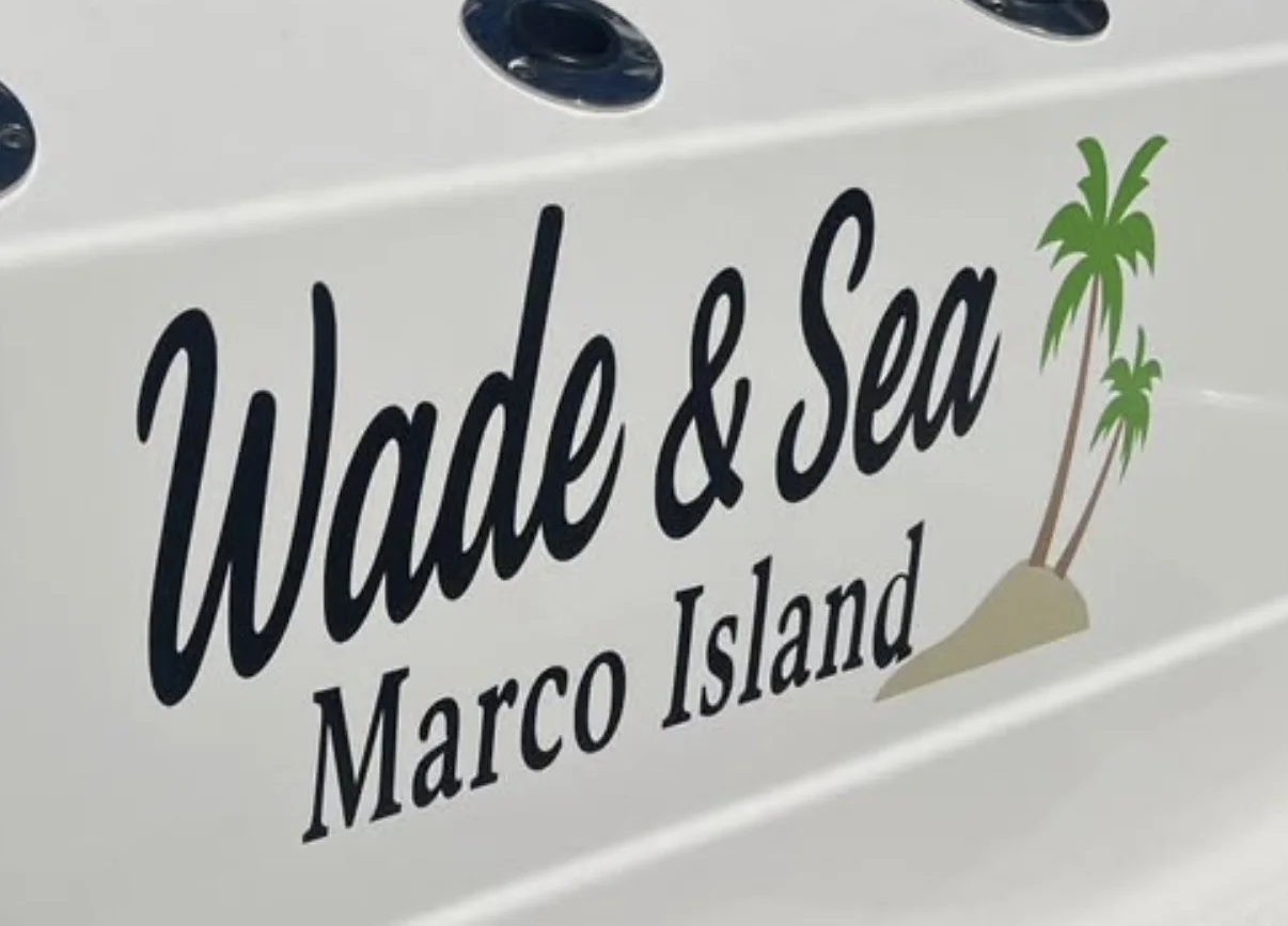 Wade & Sea: Boat name with a custom palm tree graphic